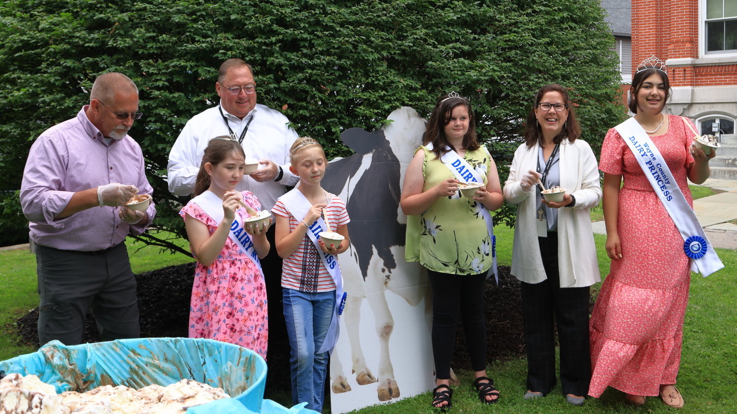 The Wayne County Commissioners were very good sports about loosing the ice cream sundae building competition to the Wayne County Dairy Princess team and everyone shared in the bounty of Wayne County made ice cream from Creamworks Creamery. From left: Commissioner Brian Smith, Dairy Miss Zoe Tyler, commissioner Joseph Adams, Dairy Miss Chloe Tyler, Dairy Miss Kenley Roberts, commissioner Jocelyn Cramer and 2022 Wayne County Dairy Princess Elektra Kahagias Dairy Princess.